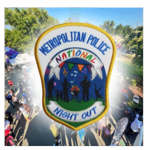 MPDC National Night Out embroidered patch with Metropolitan Police shield design featuring community silhouettes and colorful night scene