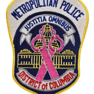 MPDC breast cancer awareness embroidered patch with pink ribbon on navy blue police shield, gold border, and Capitol building detail