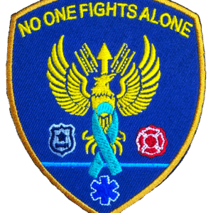 Embroidered PTSD Awareness Patch with gold border, golden phoenix, teal ribbon, eagle, and symbols for police, fire, and EMS, and the words "No One Fights Alone"